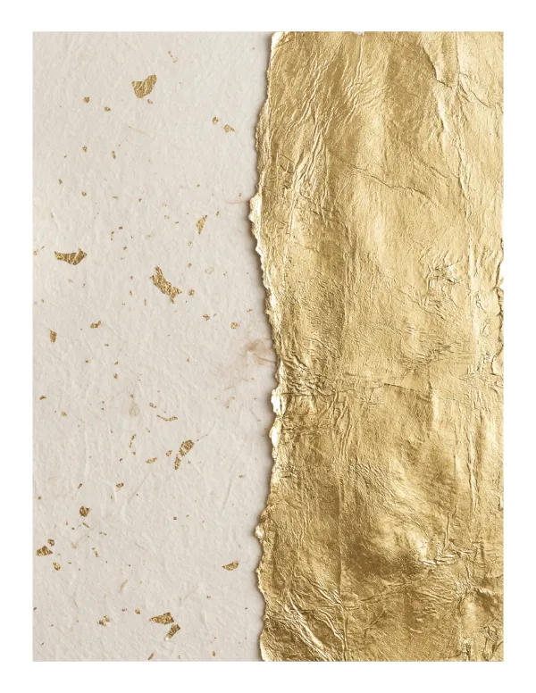 Close-up of textured cream paper with flecks of gold leaf next to crumpled metallic gold leaf.