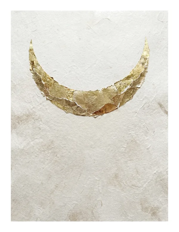 Textured ivory paper with a torn golden crescent moon shape adhered to the top.